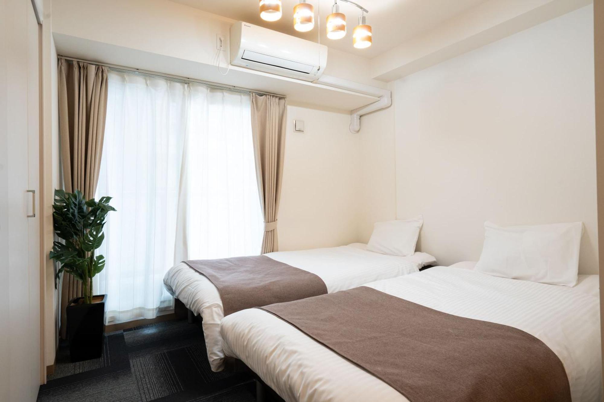 Tsubaki Garden Apartman Szapporo Szoba fotó